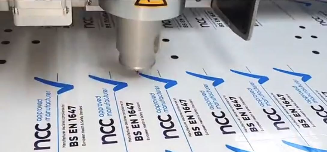 Close up of a printing machine creating resin domed labels